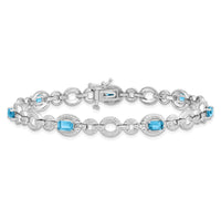 Load image into Gallery viewer, Sterling Silver Rhodium-plated Dia. &amp; Lt Swiss Blue Topaz Oval Bracelet
