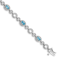 Load image into Gallery viewer, Sterling Silver Rhodium-plated Dia. &amp; Lt Swiss Blue Topaz Oval Bracelet
