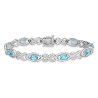 Load image into Gallery viewer, Sterling Silver Rhodium-plated Diamond &amp; Light Swiss Blue Topaz Bracelet
