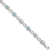 Load image into Gallery viewer, Sterling Silver Rhodium-plated Blue Topaz &amp; Diamond Bracelet
