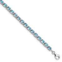 Load image into Gallery viewer, Sterling Silver Rhodium-plated Blue Topaz and Diamond Bracelet
