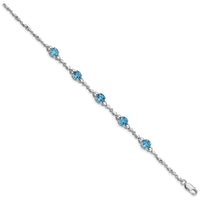 Load image into Gallery viewer, Sterling Silver Rhodium-plated Lt. Swiss Blue Topaz &amp; Diamond Bracelet
