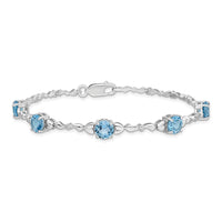 Load image into Gallery viewer, Sterling Silver Rhodium-plated Lt. Swiss Blue Topaz &amp; Diamond Bracelet
