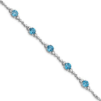 Load image into Gallery viewer, Sterling Silver Rhodium-plated Lt. Swiss Blue Topaz &amp; Diamond Bracelet
