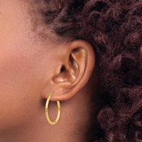 Load image into Gallery viewer, 14k Polished 2x25mm Lightweight Tube Hoop Earrings
