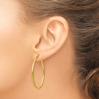Load image into Gallery viewer, 14k Polished 2x40mm Lightweight Tube Hoop Earrings
